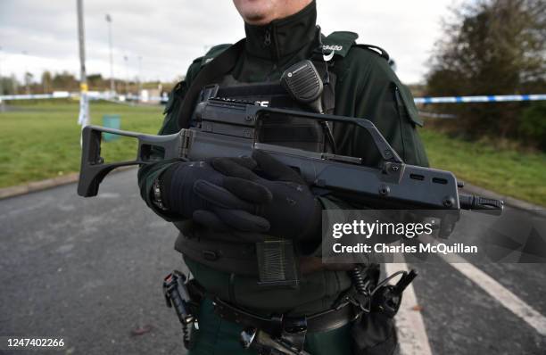 Police and forensics are seen at the scene of last nights shooting of a high profile PSNI officer at the Youth Sports Centre on February 23, 2023 in...