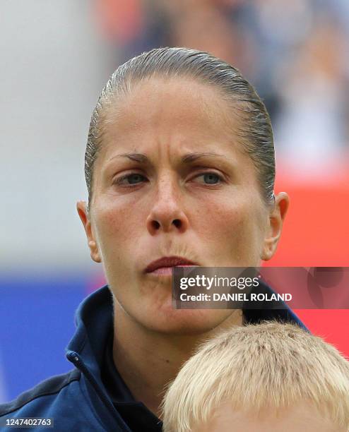 France's defender Sabrina Viguier poses for a group photo prior to the quarter-final match of the FIFA women's football World Cup England vs France...