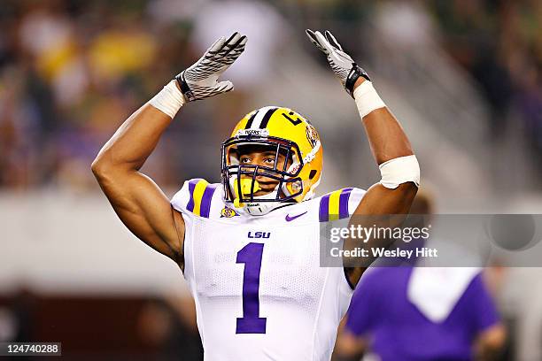 Eric Reid of the LSU Tigers gets the fans excited during a game against the Oregon Ducks at Cowboys Stadium on September 3, 2011 in Arlington, Texas....