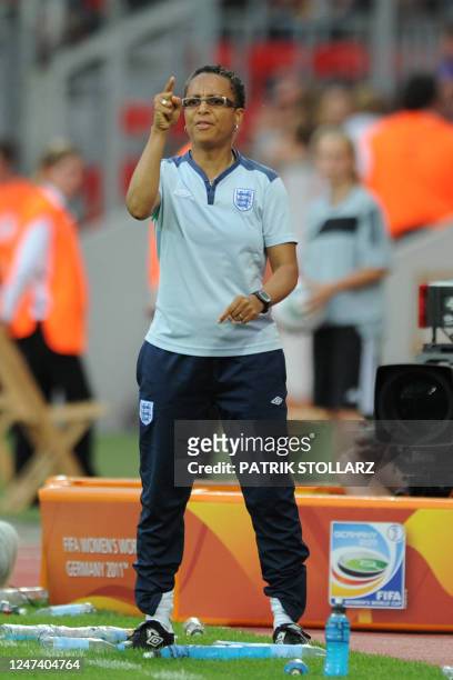 England's coach Hope Powell reacts during the quarter-final match of the FIFA women's football World Cup England vs France on July 9, 2011 in...