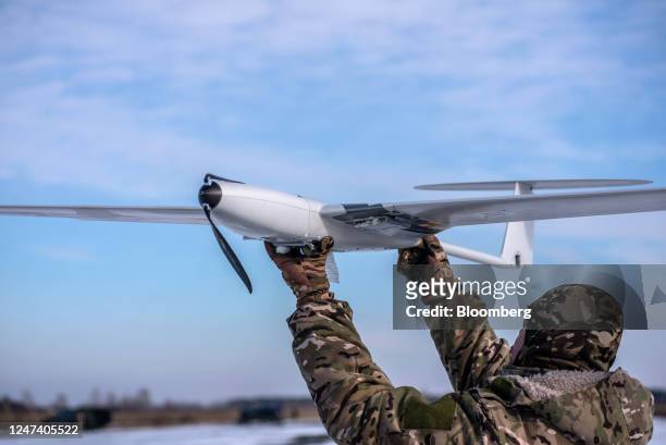 Soldier prepares to launch a Punisher Drone manufactured by UA Dynamics, which provides free training for operators and free shells to clients,...