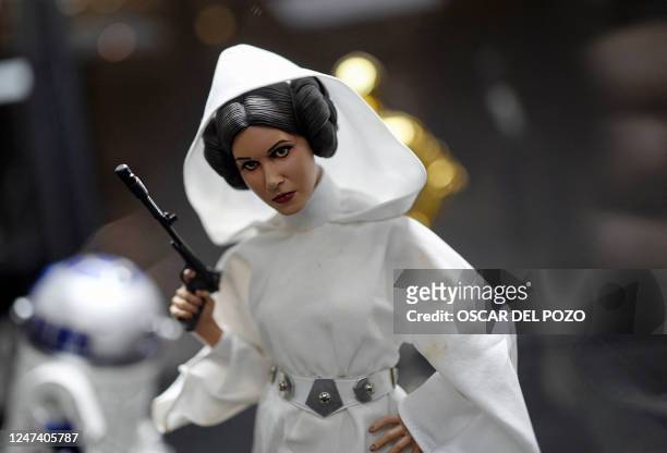 Figurine depicting Star Wars saga's character Princess Leia is pictured on the opening day of the exhibition "Fuenlabrada Friki. Universo Star Wars"...