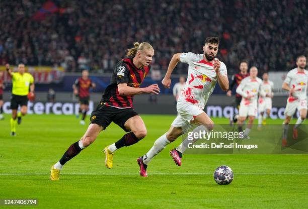 Josko Gvardiol of RB Leipzig and Erling Haaland of Manchester City . Battle for the ball during the UEFA Champions League round of 16 leg one match...