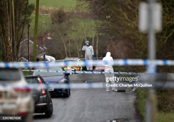 Police and forensics are seen at the scene of last nights shooting of a high profile PSNI officer at the Youth Sports Centre on February 23, 2023 in...