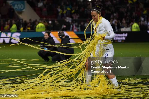 England's Lucy Bronze celebrates with the Arnold Clark streamers during the Arnold Clark Cup match between England and Belgium at Ashton Gate on...