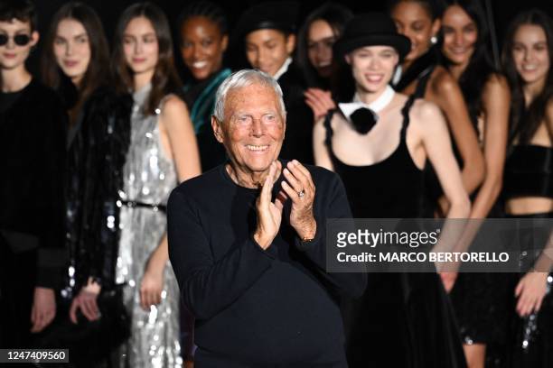 Italian fashion designer Giorgio Armani acknowledges applause during the presentation of Emporio Armani's Fall-Winter 2023-2024 Women's collection on...