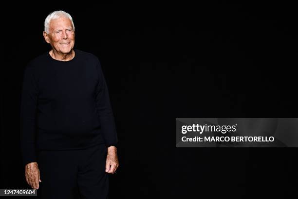 Italian fashion designer Giorgio Armani acknowledges applause during the presentation of Emporio Armani's Fall-Winter 2023-2024 Women's collection on...