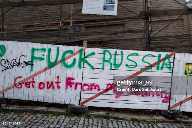 Anti-Russian graffiti on the streets of Tbilisi on February 23, 2023 in Tbilisi, Georgia. The massive influx of Russians fleeing military...