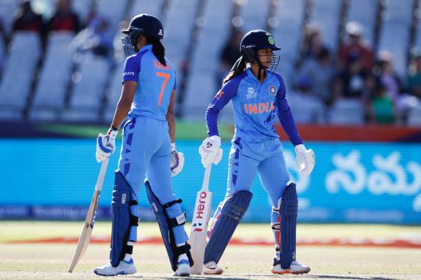 India's Harmanpreet Kaur and India's Jemimah Rodrigues stand on the pitch between overs during the semi-final T20 women's World Cup cricket match...