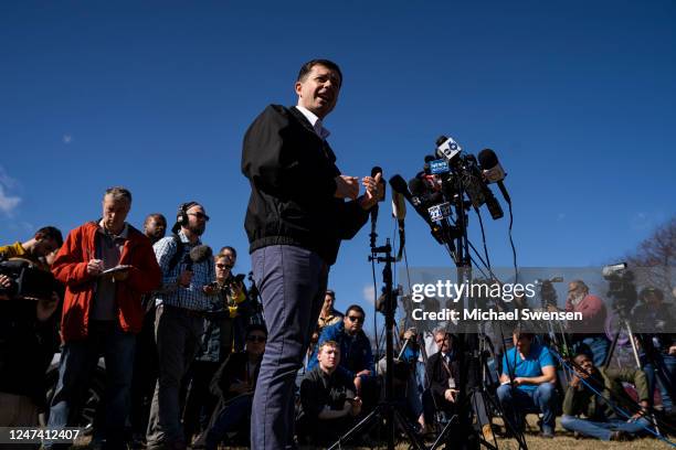 Transportation Secretary Pete Buttigieg delivers remarks to the press as he visited the site of the Norfolk Southern train derailment on February 23,...