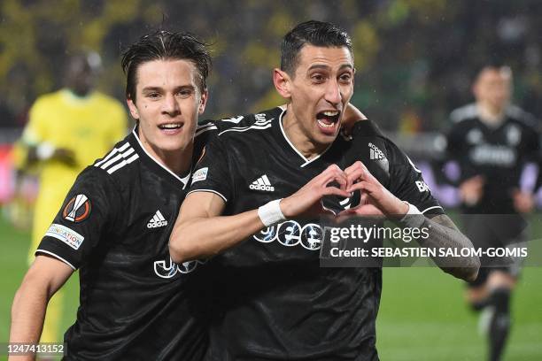 Juventus' Argentine forward Angel Di Maria celebrates with Juventus' Italian midfielder Nicolo Fagioli after scoring his team's second goal during...