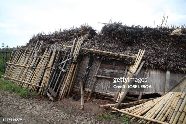 This image shows a traditional house of the east coast of Madagascar destroyed in the aftermath of cyclone Freddy in Mananjary on February 23, 2023....