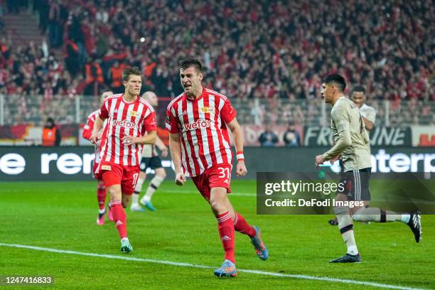 Robin Knoche of 1.FC Union Berlin cheers after his first goal during the UEFA Europa League knockout round play-off leg two match between 1. FC Union...