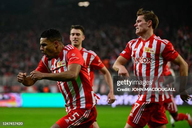 Union Berlin's Dutch defender Danilho Doekhi celebrates scoring the 3-1 goal with his team-mates during the UEFA Europa League play-off 2nd-leg...