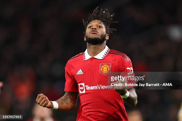 Fred of Manchester United celebrates after scoring a goal to make it 1-1 during the UEFA Europa League knockout round play-off leg two match between...