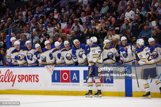 Tage Thompson of the Buffalo Sabres celebrates a goal with teammates against the Tampa Bay Lightning during the second period at Amalie Arena on...