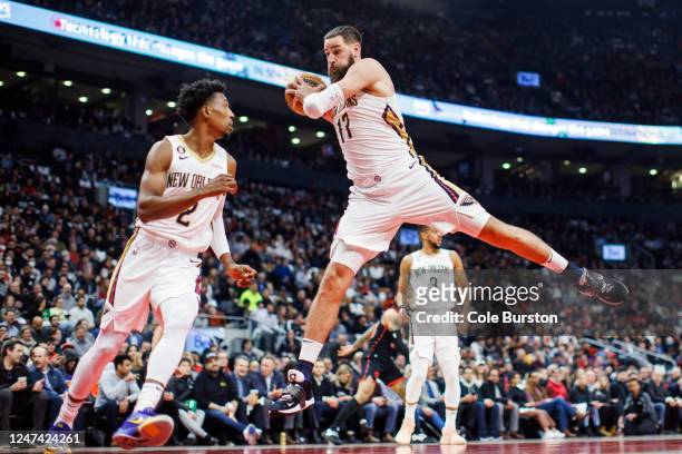Jonas Valanciunas of the New Orleans Pelicans grabs a loose ball during the first half of their NBA game against the Toronto Raptors at Scotiabank...