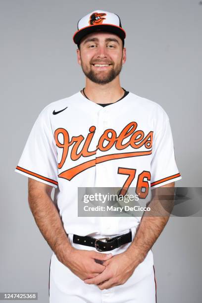 Colton Cowser of the Baltimore Orioles poses for a photo during the Baltimore Orioles Photo Day at Ed Smith Stadium on Thursday, February 23, 2023 in...