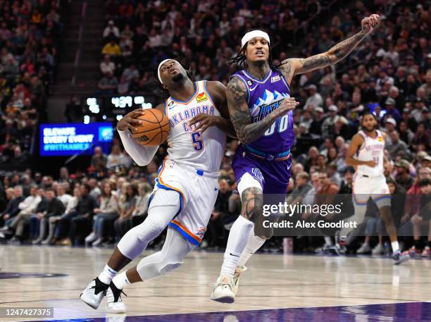 Jordan Clarkson of the Utah Jazz defends Luguentz Dort of the Oklahoma City Thunder during the second half of a game at Vivint Arena on February 28,...