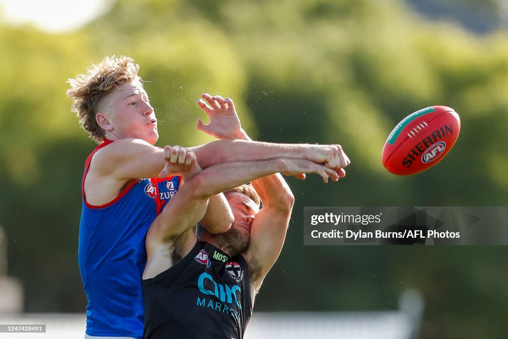 Jacob Crouch Jacob van Rooyen of the Demons and Brad Crouch of the Saints compete ...