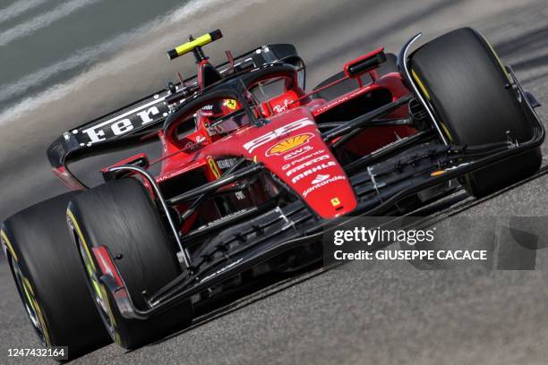 Ferrari's Spanish driver Carlos Sainz Jr drives during the second day of Formula One pre-season testing at the Bahrain International Circuit in...