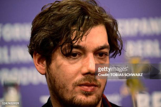 German actor Timocin Ziegle looks on during a press conference for the film "Bis ans Ende der Nacht" presented in competition of the Berlinale,...
