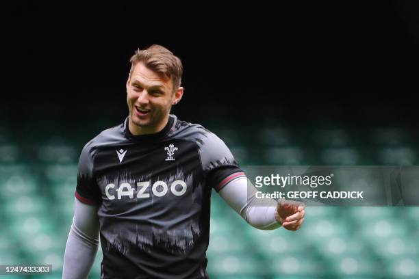 Wales' Dan Biggar takes part in the captain's run at the Millennium Stadium also known as Principality Stadium, in Cardiff, on February 24 ahead of...