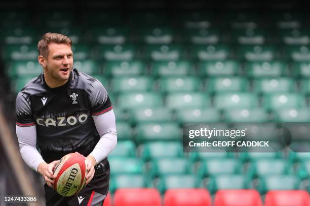 Wales' Dan Biggar takes part in the captain's run at the Millennium Stadium also known as Principality Stadium, in Cardiff, on February 24 ahead of...