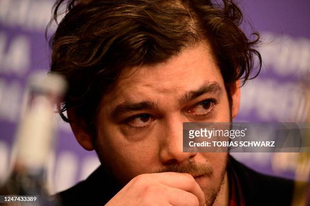 German actor Timocin Ziegle looks on during a press conference for the film "Bis ans Ende der Nacht" presented in competition of the Berlinale,...