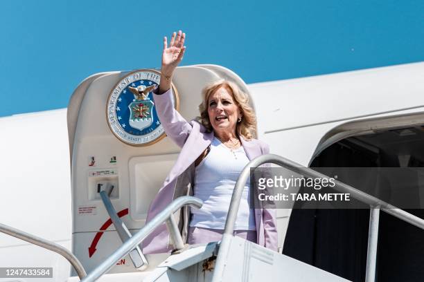 First Lady Jill Biden waves before entering the plane on her departure to Kenya from the Hosea Kutako International Airport in Windhoek on February...