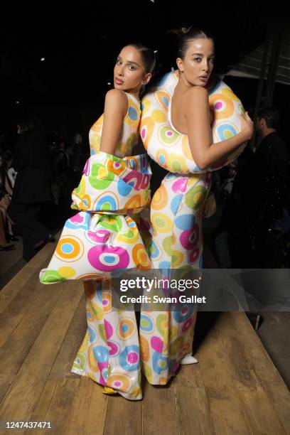 Hala Alasmari and Julia Hussein in the front row at Moschino Fall 2023 Ready To Wear Runway Show on February 23, 2023 at Officina Ventura in Milan,...