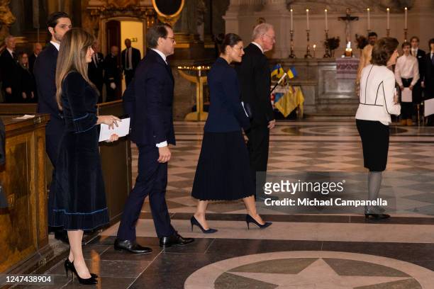 Queen Silvia, Crown Princess Victoria, Prince Daniel, Prince Carl Philip, and Princess Sofia of Sweden attend a Peace Prayer marking the one year...