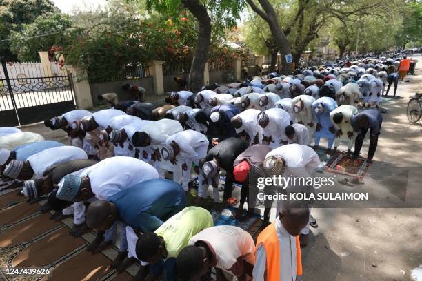 Muslim faithfuls gather at the Al-Furqan Mosque compound for Friday Jumat prayers in Kano, Nigeria, on February 24 ahead of the Nigerian presidential...