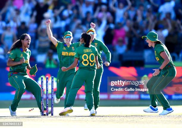 Shabnim Ismail and team mates of South Africa celebrate after winning the match during the ICC Women's T20 World Cup Semi Final match between England...