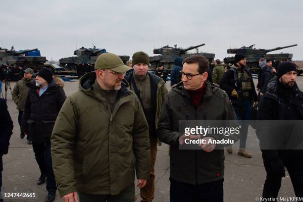Polish Prime Minister Mateusz Morawiecki inspects the site with Ukrainian Prime Minister Denys Shmyhal as he receives information from officials...
