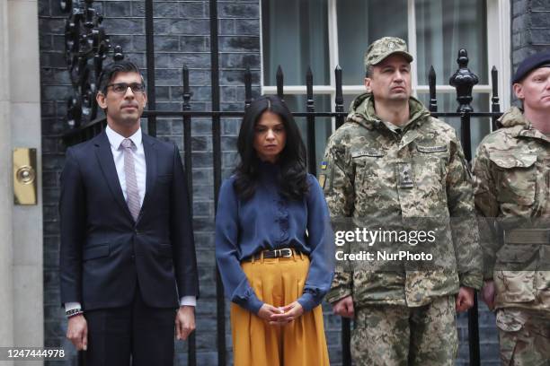 On the First Anniversary of Ukrainian War with Russia , British Prime Minister and his wife , Akshata Murthy stands in Downing Street, London, on e...