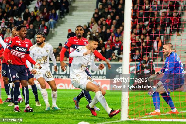 Achraf Dari of Stade Brestois celebrates after scoring his team's first goal during the Ligue 1 Uber Eats match between Lille and Brest at Stade...