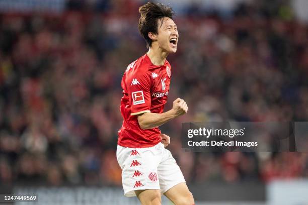 Jae Sung Lee of 1. FSV Mainz 05 celebrates after scoring his teams first goal during the Bundesliga match between 1. FSV Mainz 05 and Borussia...