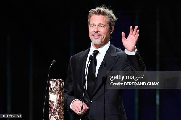 Actor Brad Pitt gestures as he speaks during the 48th edition of the Cesar Film Awards ceremony at the Olympia venue in Paris on February 24, 2023.