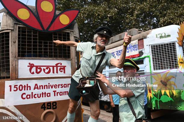 Conductor of Melbourne Tramway Netwowk Roberto D'Andrea and Tony Graham show Melbourne Tram tickets in an event Tramjatra 2023, a week long...