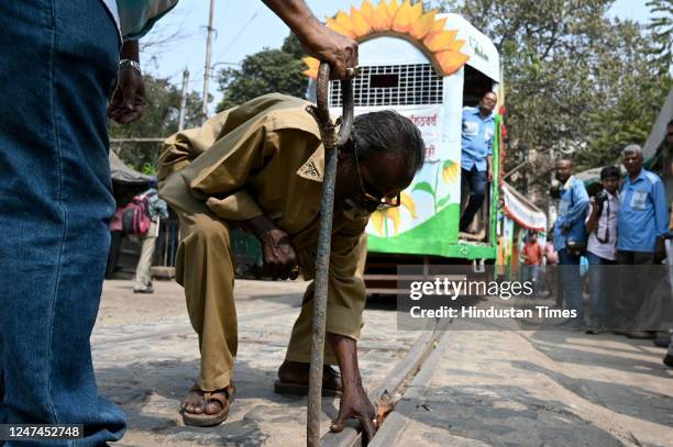 Lineman adjust thr tram track during an event Tramjatra 2023, a week long celebration of 150 years of Trams of Kolkata, highlights the themes of...