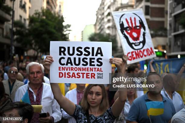 People demonstrate in front of the Russian embassy in Buenos Aires, on February 24 on the first anniversary of the Russian invasion of Ukraine. -...