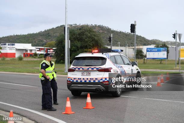 Police are seen directing traffic at the scene of the car accident on June 07, 2020 in Townsville, Australia. Four teenagers have been killed in a...