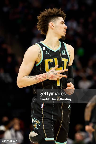 LaMelo Ball of the Charlotte Hornets celebrates his three-point basket against the Minnesota Timberwolves in the fourth quarter of the game at Target...