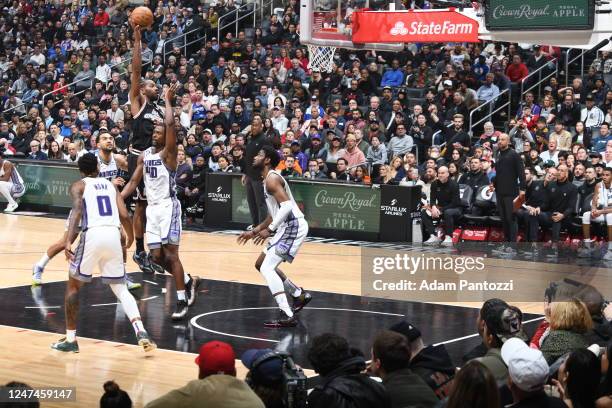 Kawhi Leonard of the LA Clippers drives to the basket during the game against the Sacramento Kings on February 24, 2023 at Crypto.Com Arena in Los...