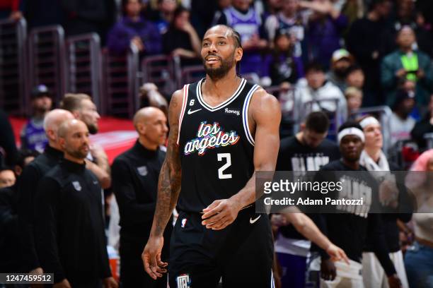 Kawhi Leonard of the LA Clippers smiles during the game against the Sacramento Kings on February 24, 2023 at Crypto.Com Arena in Los Angeles,...