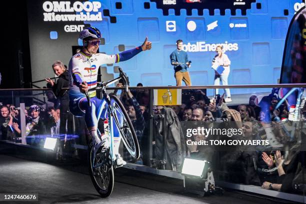 Slovak Peter Sagan of TotalEnergies entertains the crowd with a wheelie at 'Het Kuipke' ahead of the 78th edition of the men's one-day cycling race...