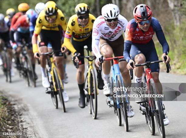 Britain's Tom Pidcock of Ineos Grenadiers attacks during the 78th edition of the men's one-day cycling race Omloop Het Nieuwsblad 3 km from Ghent to...