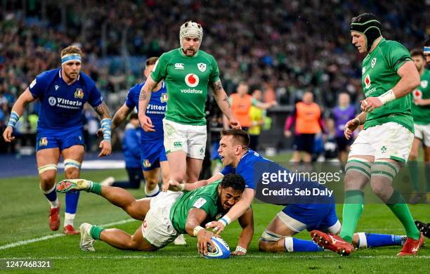 Rome , Italy - 25 February 2023; Bundee Aki of Ireland dives over the line to score his side's fifth try which was subsequently disallowed during the...