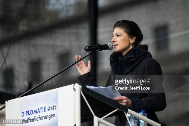 Sahra Wagenknecht, member of the left wing party Die Linke holds a speech in front the Brandenburg Gate during a protest for peace negotiations with...